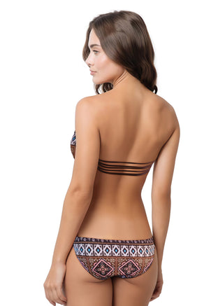 Woman wearing a brown bandeau bikini with geometric pattern on a white background