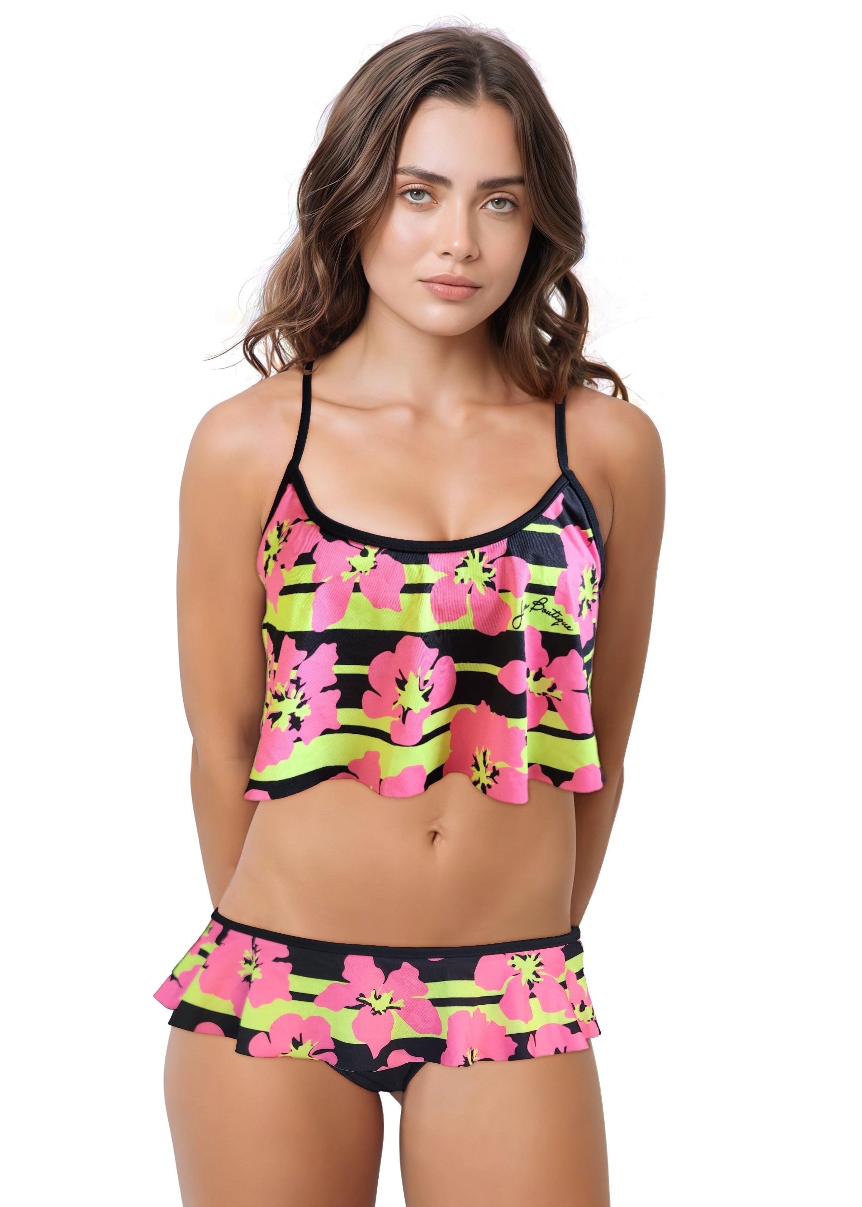 Woman wearing a colorful bikini with pink flowers and black stripes on a white background