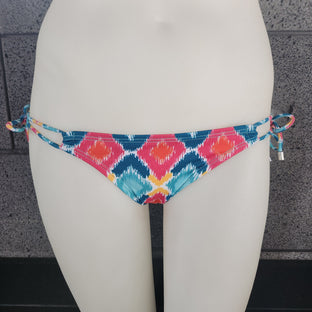 Colorful bikini bottom with geometric pattern on a neutral background