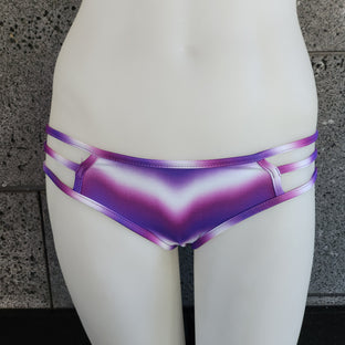 Purple Tie-dye bikini bottom on a mannequin against a gray background