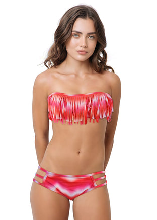 Woman wearing a purple fringe bikini set on a white background