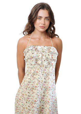 Woman wearing a floral dress on a white background