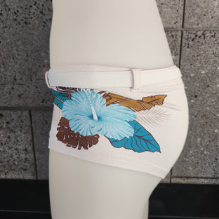 Red swimsuit with floral patterns on a white mannequin