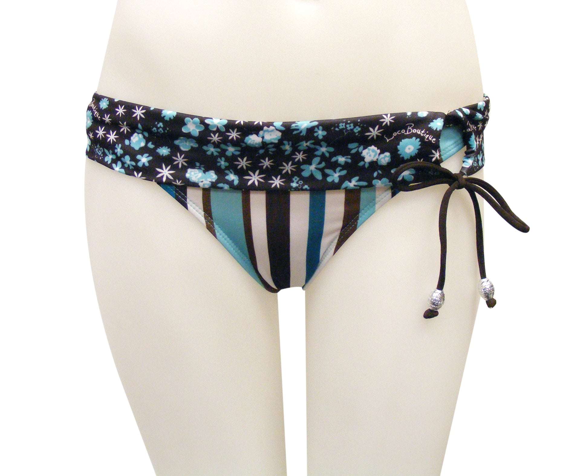 Folded over swim bottoms with side gathered ties and aluminum beads, displayed on a mannequin.