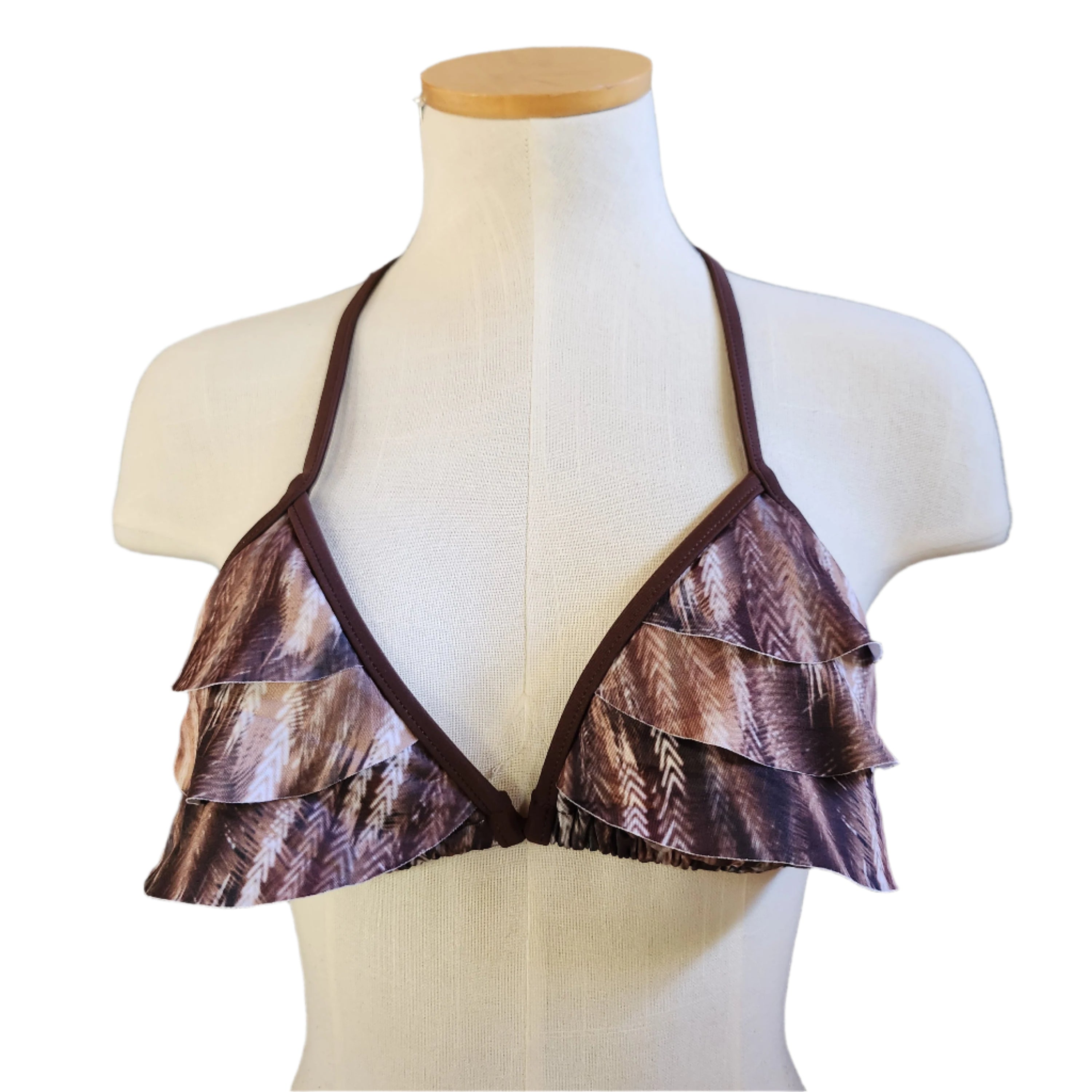 Brown ruffled bikini top on a mannequin against a white background.