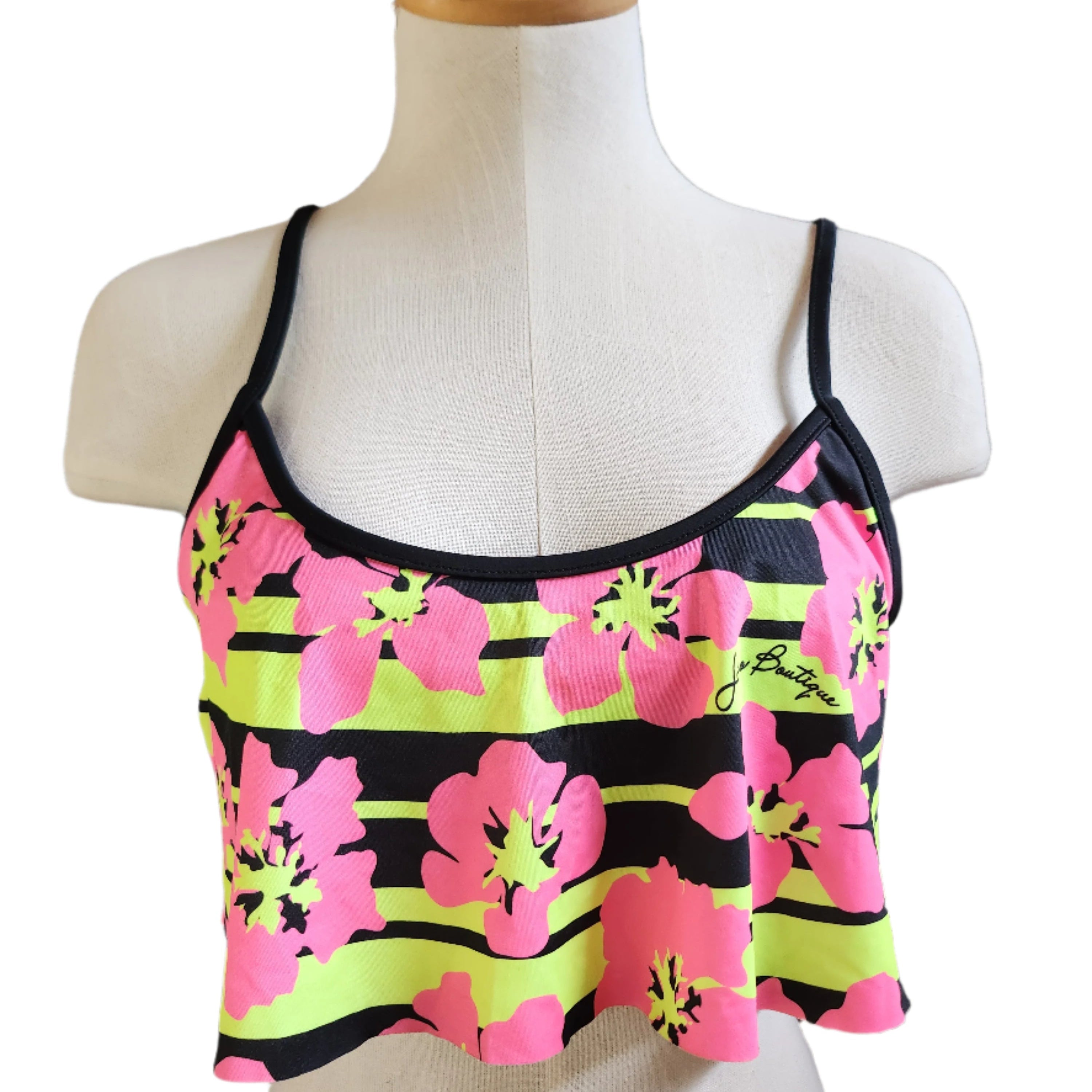 Floral bikini top on a mannequin against a white background.