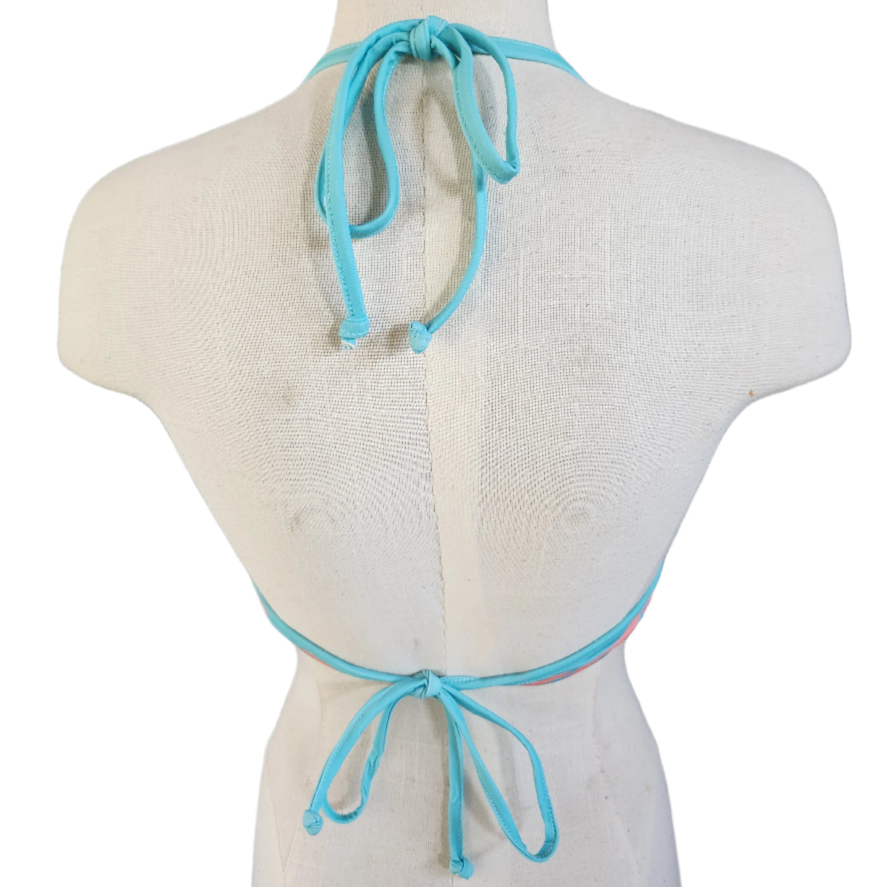 Batik artistry underwire on a model against a white background.