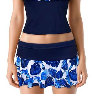 A navy-colored skort with a flared design and blue 3D flower embellishments, paired with a navy top.