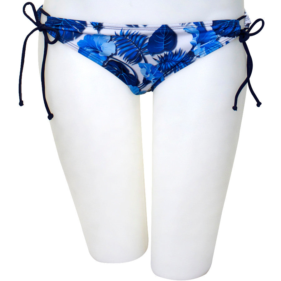 A swimsuit with a floral pattern, featuring a keyhole design and gathered fabric, primarily in blue and white colors. 