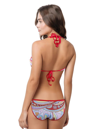 Woman wearing a colorful bikini set on a white background