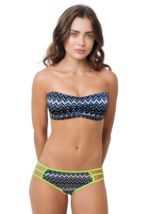 Woman wearing a bikini set with zig zag pattern on a white background.