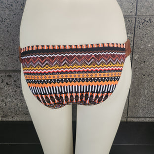 Colorful patterned bikini belt on a mannequin with a neutral background